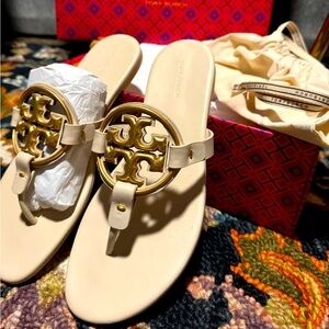 Like new! Wore them for 10 mins. Authentic Tory Burch Miller Soft Metal Logo